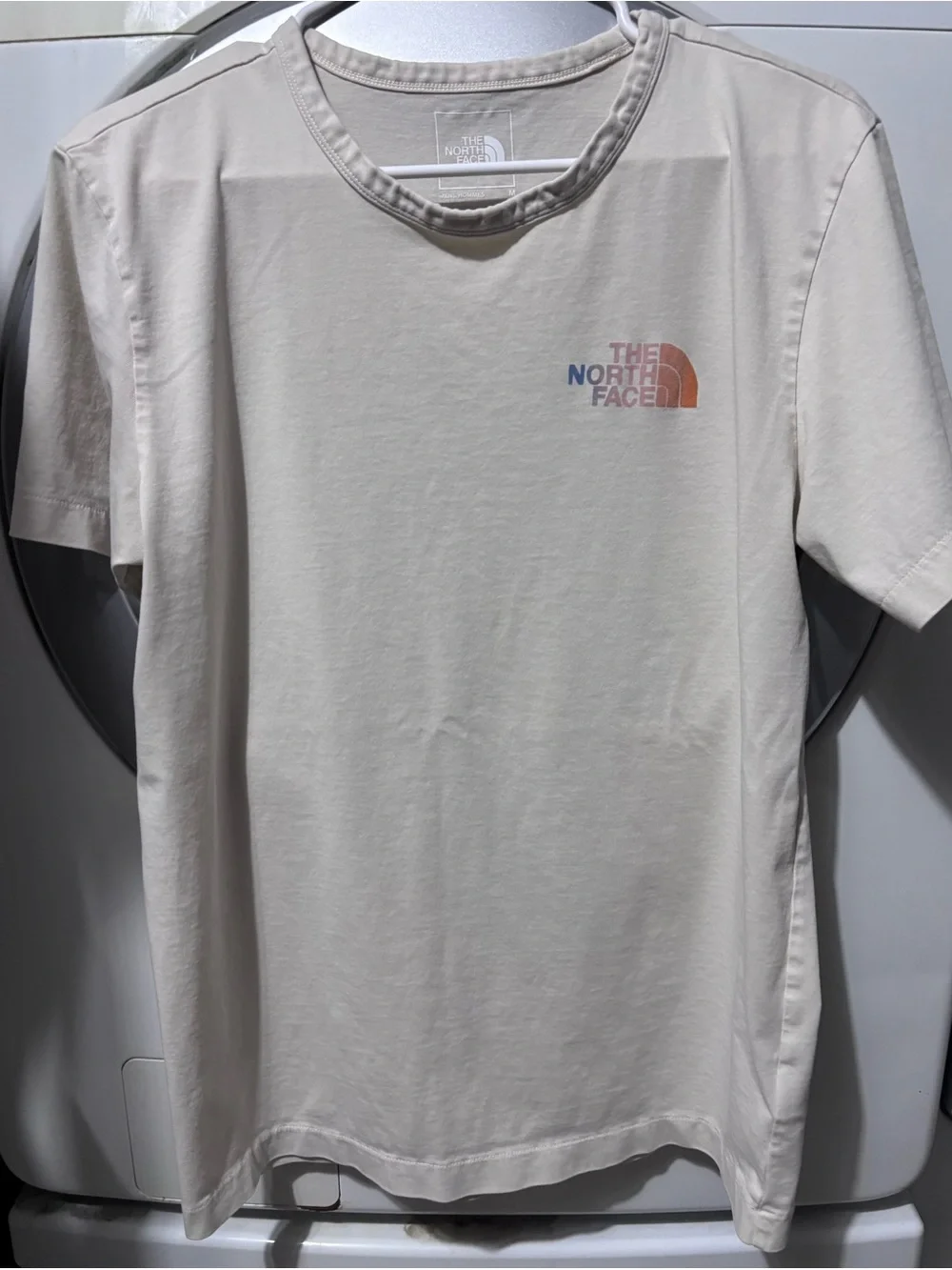 The North Face Men’s Short-Sleeve Logo Tee — Light Taupe with Multicolor Logo